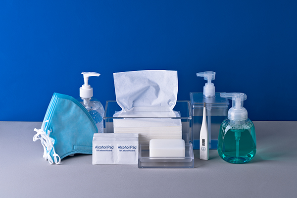 Anti-epidemic Supplies Collection on Blue Colored Background.