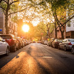 A sunny street in Brooklyn, in the late afternoon
