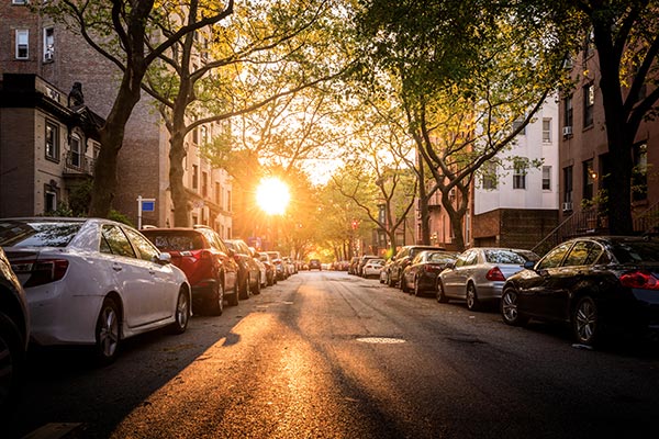 A sunny street in Brooklyn, in the late afternoon