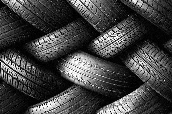 Tires stacked in zig zag pattern