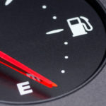 Close-up car dash board petrol meter, fuel gauge, with over full gasoline in car. Clip. Gasoline sensor