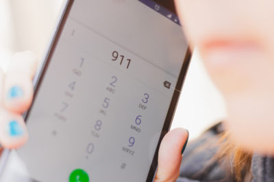 Smartphone screen with the emergency number 911 dialed – Person calling the support service phone line asking for help