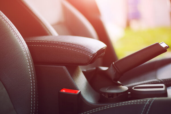 armrest in the luxury passenger car, detail in the interior