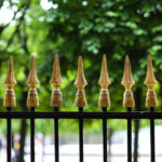 Metallic Fence Against Trees