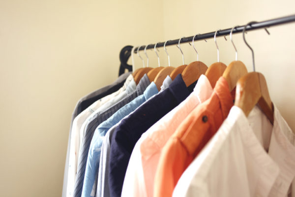 Open wardrobe is usually adapted for a small living space. The shirts, dresses or coats are hanged on a clothing rail, and some shelving at the bottom.