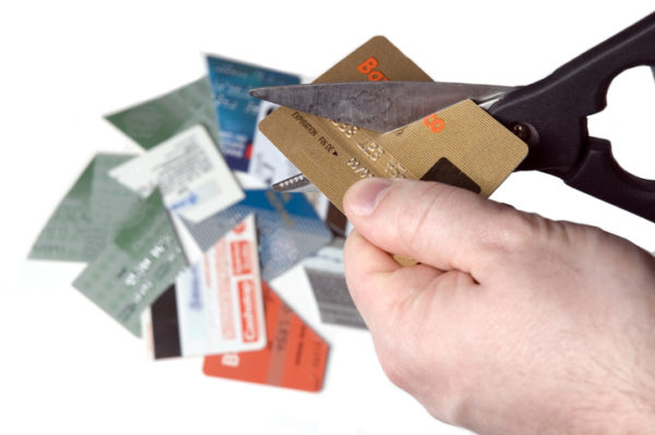 hand cutting credit cards