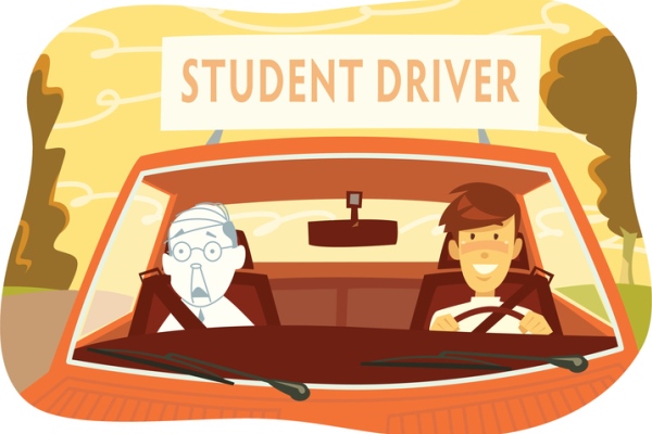 Terrified driving instructor with student