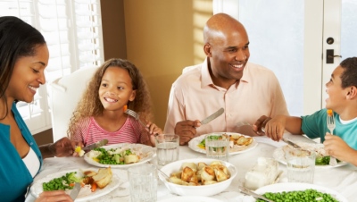 Family Enjoying Meal At Home