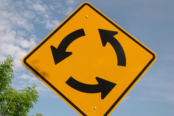 Traffic circle roundabout sign