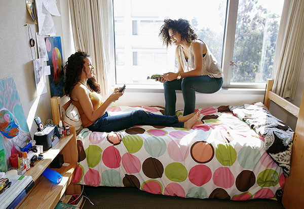 female students in dorm room