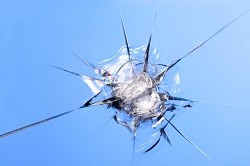 macro shot of a rock chip on windshield