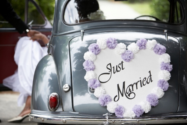 Just married sign on back of vintage car
