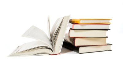 stack of textbooks on white background