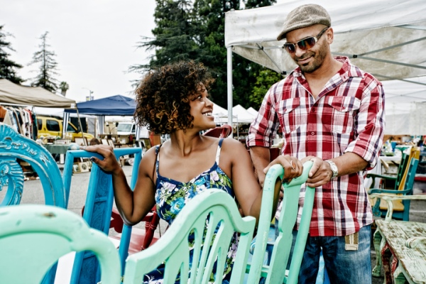 young african-american couple shopping at a flea market